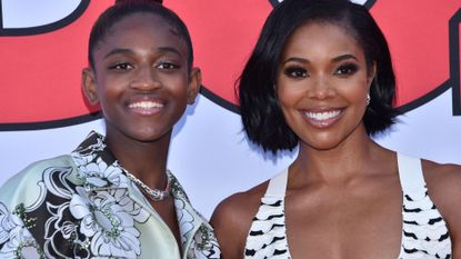 US actress Gabrielle Union (R) and her daughter Zaya Wade arrive for the "Cheaper by the Dozen" Disney premiere at the El Capitan theatre in Hollywood, California, March 16, 2022