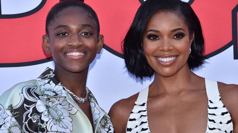 US actress Gabrielle Union (R) and her daughter Zaya Wade arrive for the "Cheaper by the Dozen" Disney premiere at the El Capitan theatre in Hollywood, California, March 16, 2022