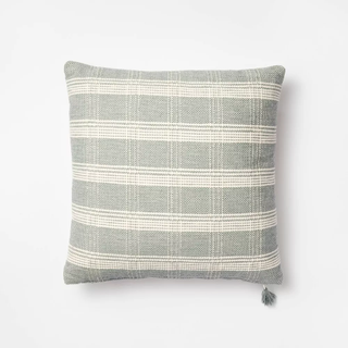 A woven plaid throw pillow