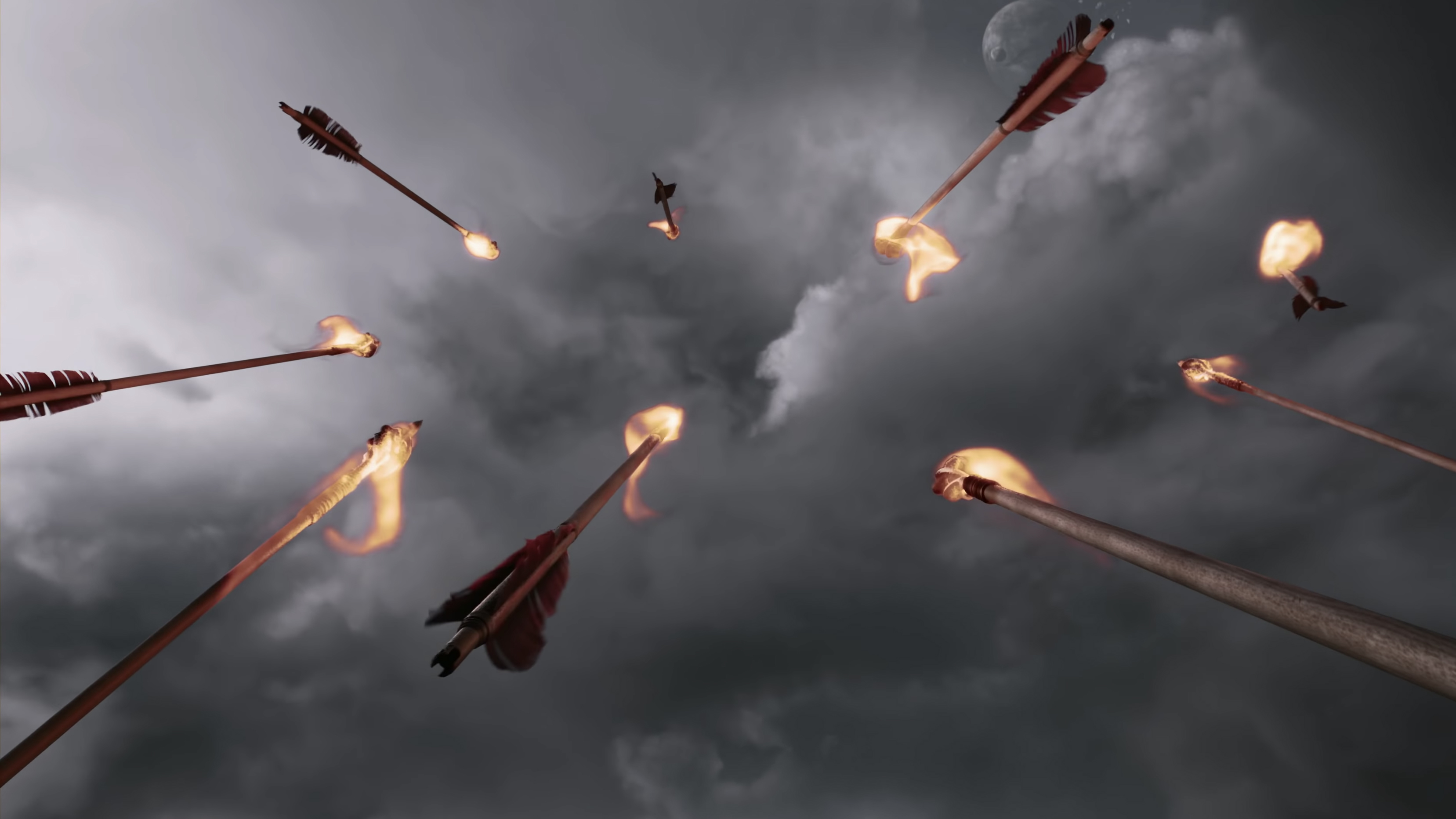 Flaming arrows against a cloudy sky