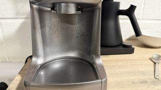 a photo of the breville dose control pro, called sage dose control pro in the uk, grinder showing static and clumping