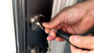 Removing standard deadbolt lock