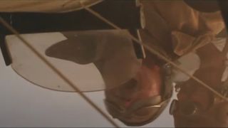 Bernard Fox laughs as he pilots a biplane through a sandstorm upside down in The Mummy.