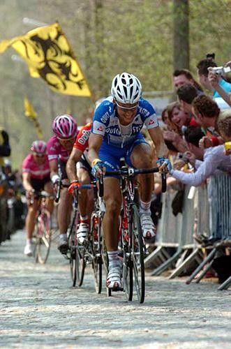 Tom Boonen (Quick.Step) steps on the gas on the Bosberg, causing pain