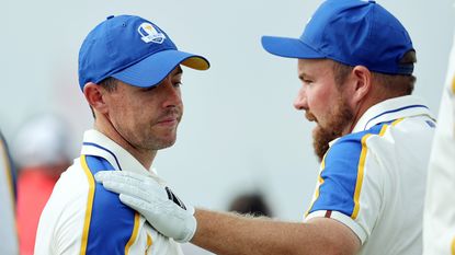 Rory McIlroy is consoled by Shane Lowry after defeat in the Ryder Cup at Whistling Straits