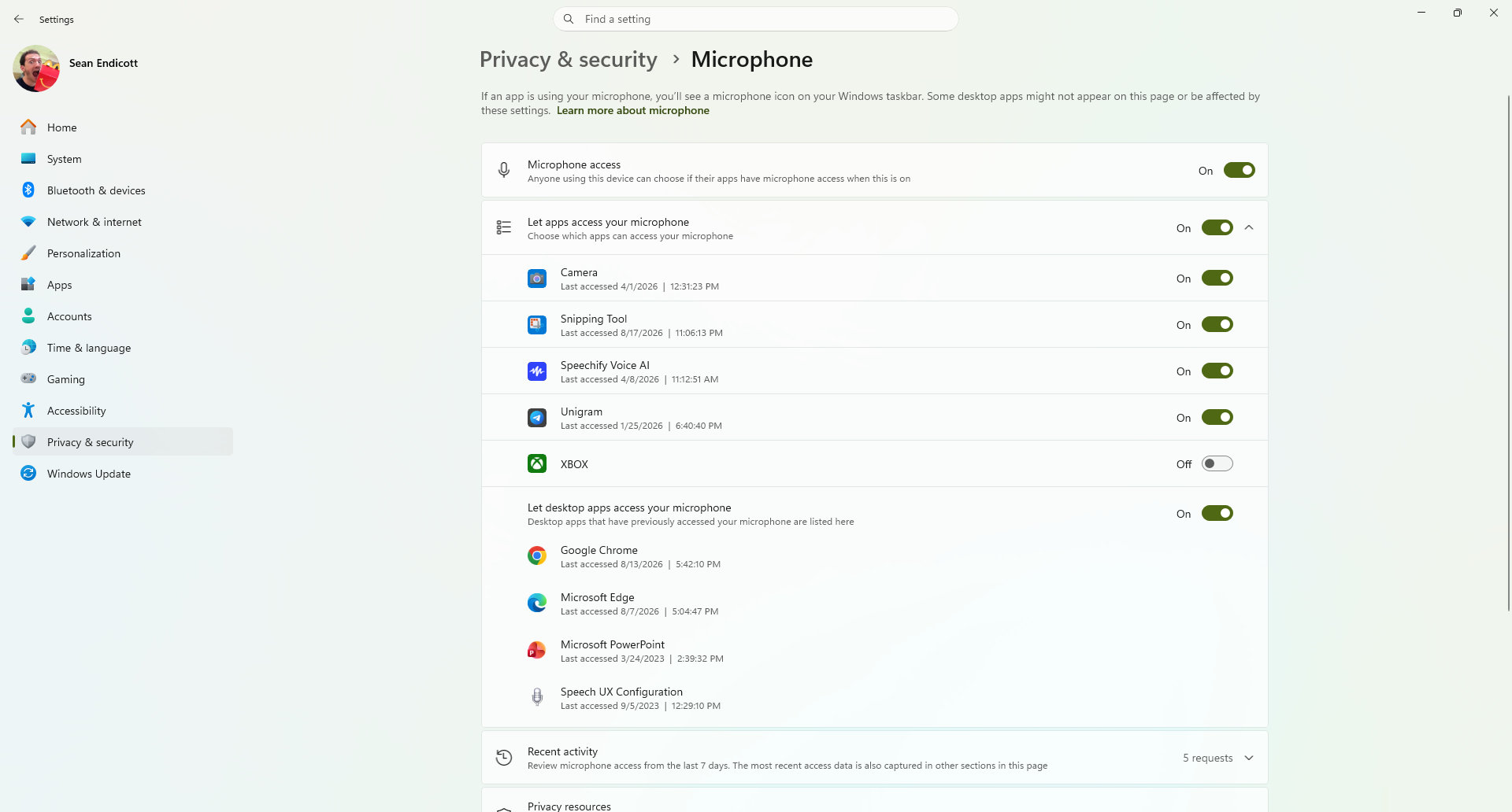 Windows 11 Settings app showing the Microphone permissions page under Privacy &amp;amp; security, displaying app toggles for microphone access.