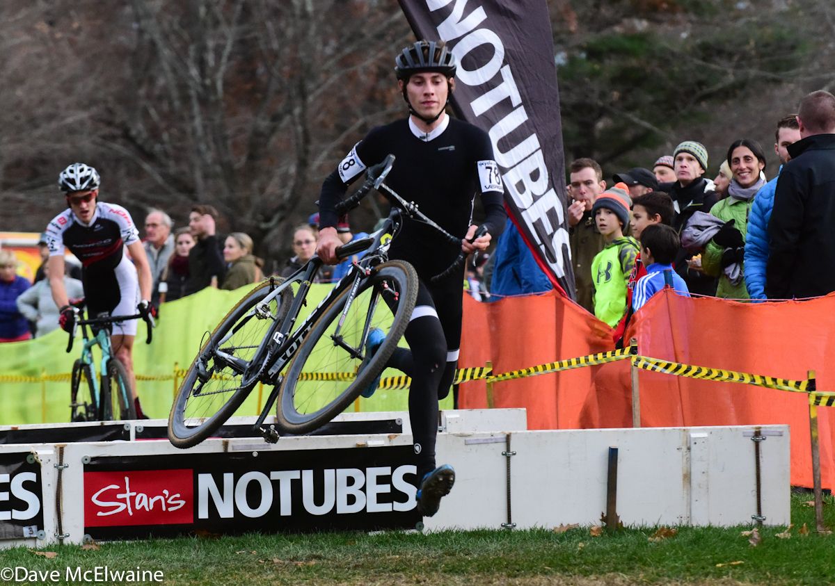 Cameron Dodge running the barriers with one lap to go.