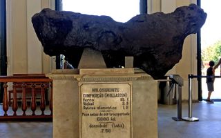 The Bendegó meteorite sits on display inside the entrance of the National Museum of Brazil.