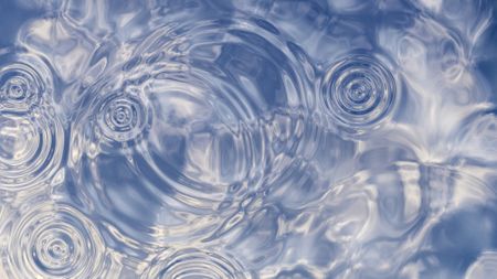 Ripples on the surface of water.