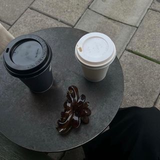 Cafe table with coffee cups and claw clip