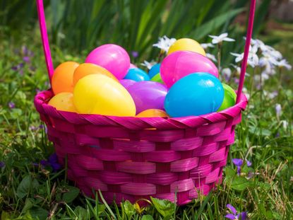 Pink Easter Basket Full Of Plastic Eggs
