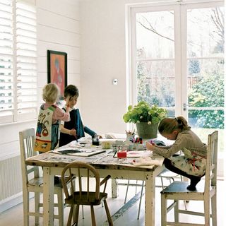 children work space with wooden table and chair