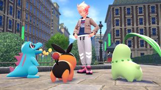 Starter Pokemon Totodile, Tepig, and Chikorita stand in front of trainer Urbain in Pokemon Legends: Z-A.