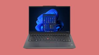Lenovo ThinkPad E14 Gen 5 laptop against a red background