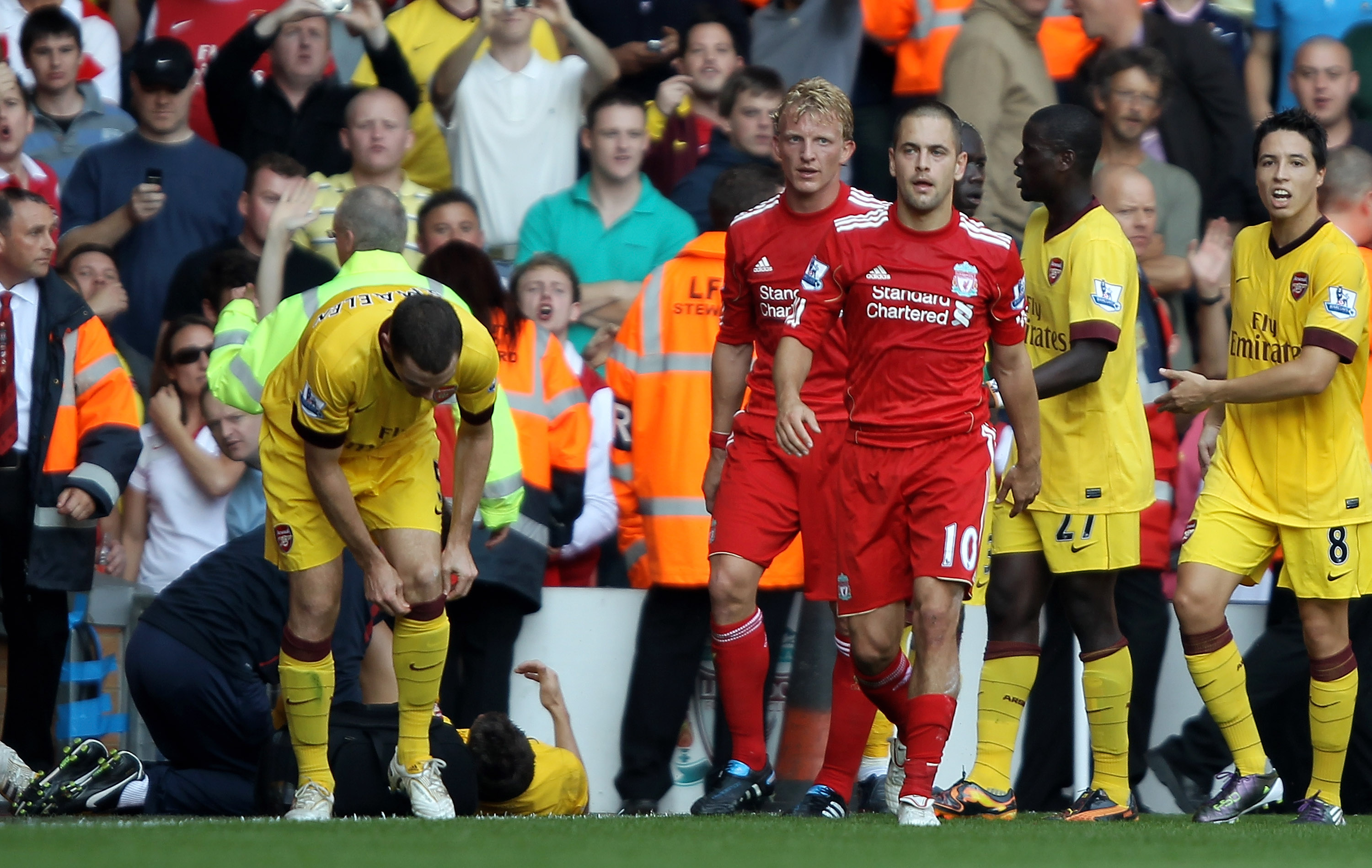 Joe Cole leaves the pitch after his red card playing for Liverpool against Arsenal in August 2010.