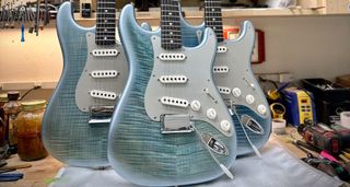 Three stunning Custom Shop Strats: Ice-blue trans finishes over figured maple make these Strats by Austin MacNutt stand out