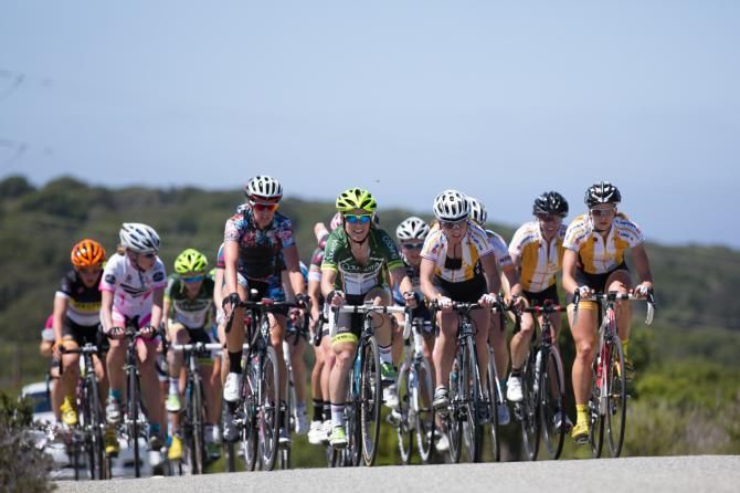 The women's field stayed together for most of their race, held under clear skies and in warm temperatures.