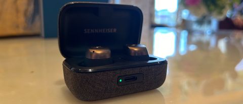 Sennheiser Momentum True Wireless 4 in black copper in their charging case