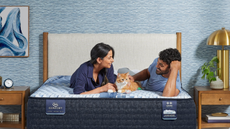 Couple lying down on mattress