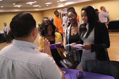 People at an employment fair.