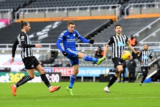 Leicester City’s Jamie Vardy (centre) has a shot on goal against Newcastle