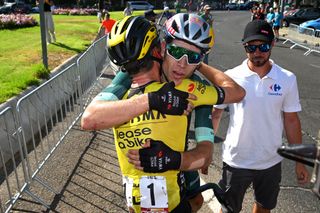 CORDOBA SPAIN AUGUST 23 LR Sepp Kuss of The United States and stage winner Wout van Aert of Belgium and Team Visma Lease a Bike Green Points Jersey react after the La Vuelta 79th Tour of Spain 2024 Stage 7 a 1805km stage from Archidona to Cordoba UCIWT on August 23 2024 in Cordoba Spain Photo by Dario BelingheriGetty Images