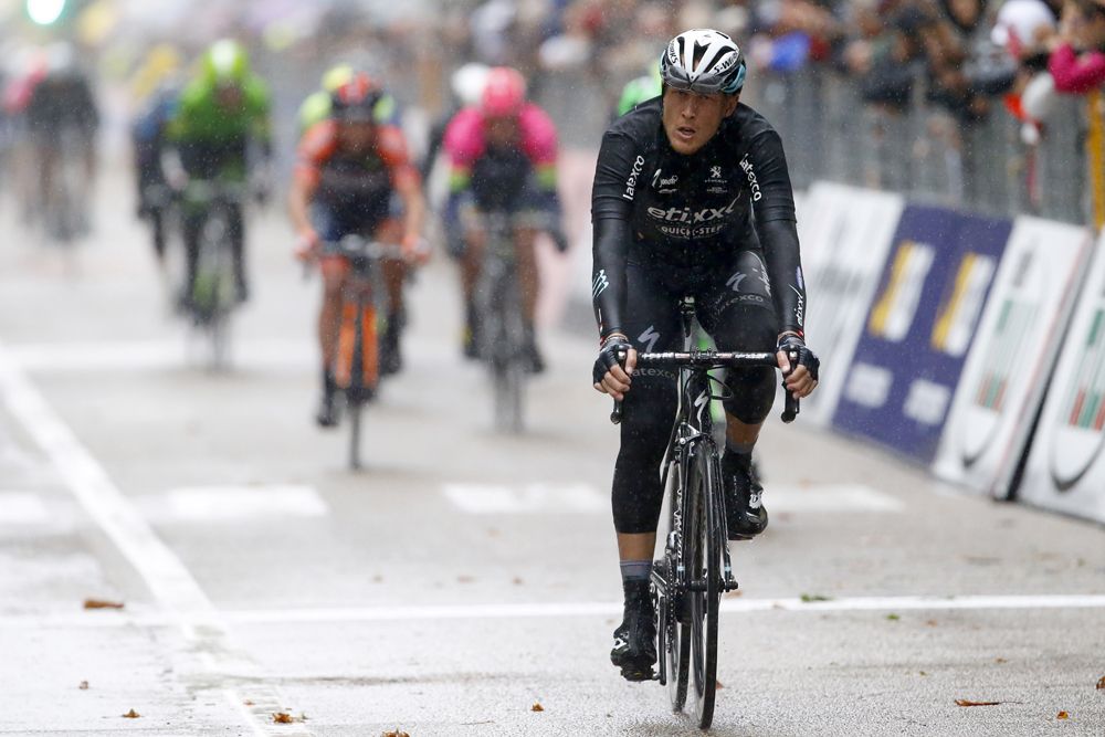 Matteo Trentin crosses the line for second