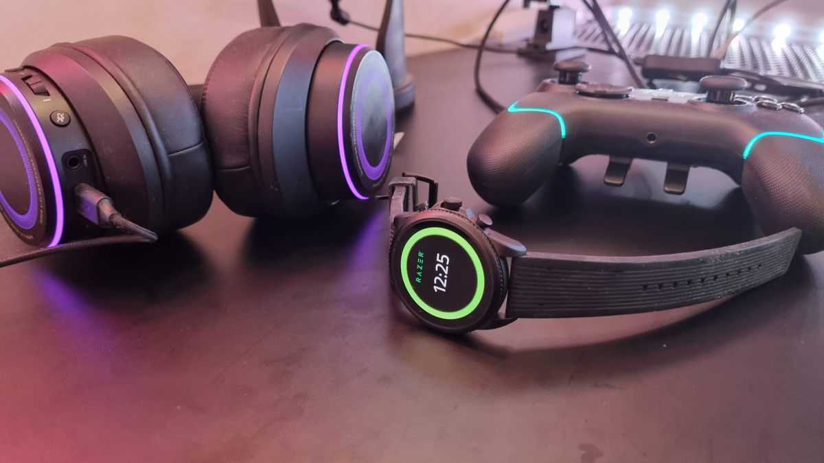 Razer X Fossil Gen 6 smartwatch on a desk with gaming peripherals