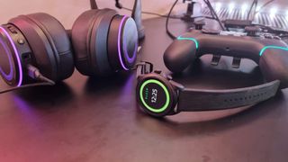 Razer X Fossil Gen 6 smartwatch on a desk with gaming peripherals