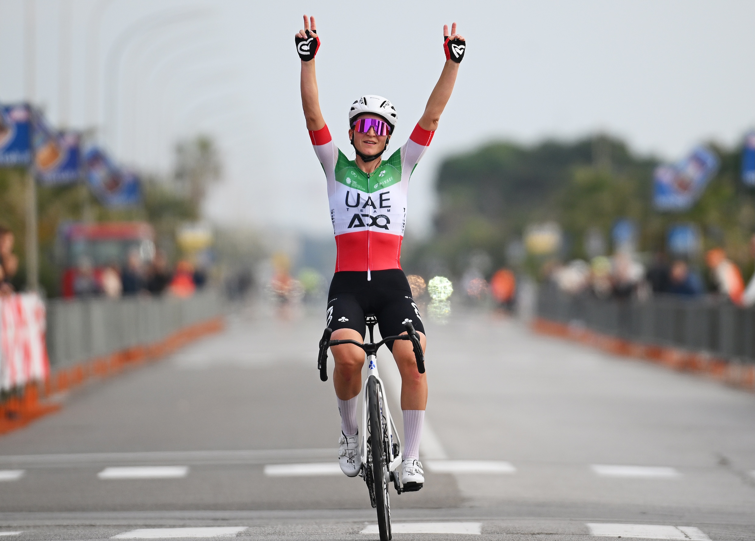 CINQUALE, ITALY - MARCH 08: Elisa Longo Borghini of Italy and UAE Team ADQ celebrates at finish line as race winner during the 14th Trofeo Oro in Euro 2026 a 106.8km one day race from Cinquale to Cinquale on March 08, 2026 in Cinquale, Italy. (Photo by Tim de Waele/Getty Images)