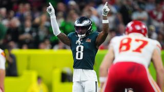 C.J. Gardner-Johnson #8 of the Philadelphia Eagles lines up against the Kansas City Chiefs with his arms in the air.