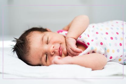 baby sleeping to highlight warning over using weighted sleep sacks