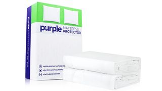 Best mattress protector: The Purple Mattress Protector in white, shown next to the white, purple and green packaging it arrives in