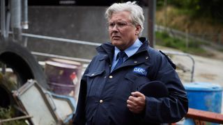 Conleth Hill as Sergeant PJ Collins in Holding.