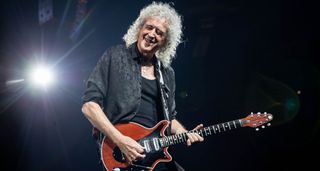 Brian May plays onstage with his Red Special