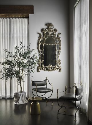 An vintage, silver antique mirror in the living room