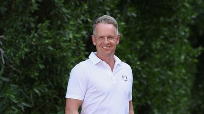 Luke Donald poses in his Team Europe Ryder Cup polo after confirming Edoardo Molinari as his vice-captain for 2025