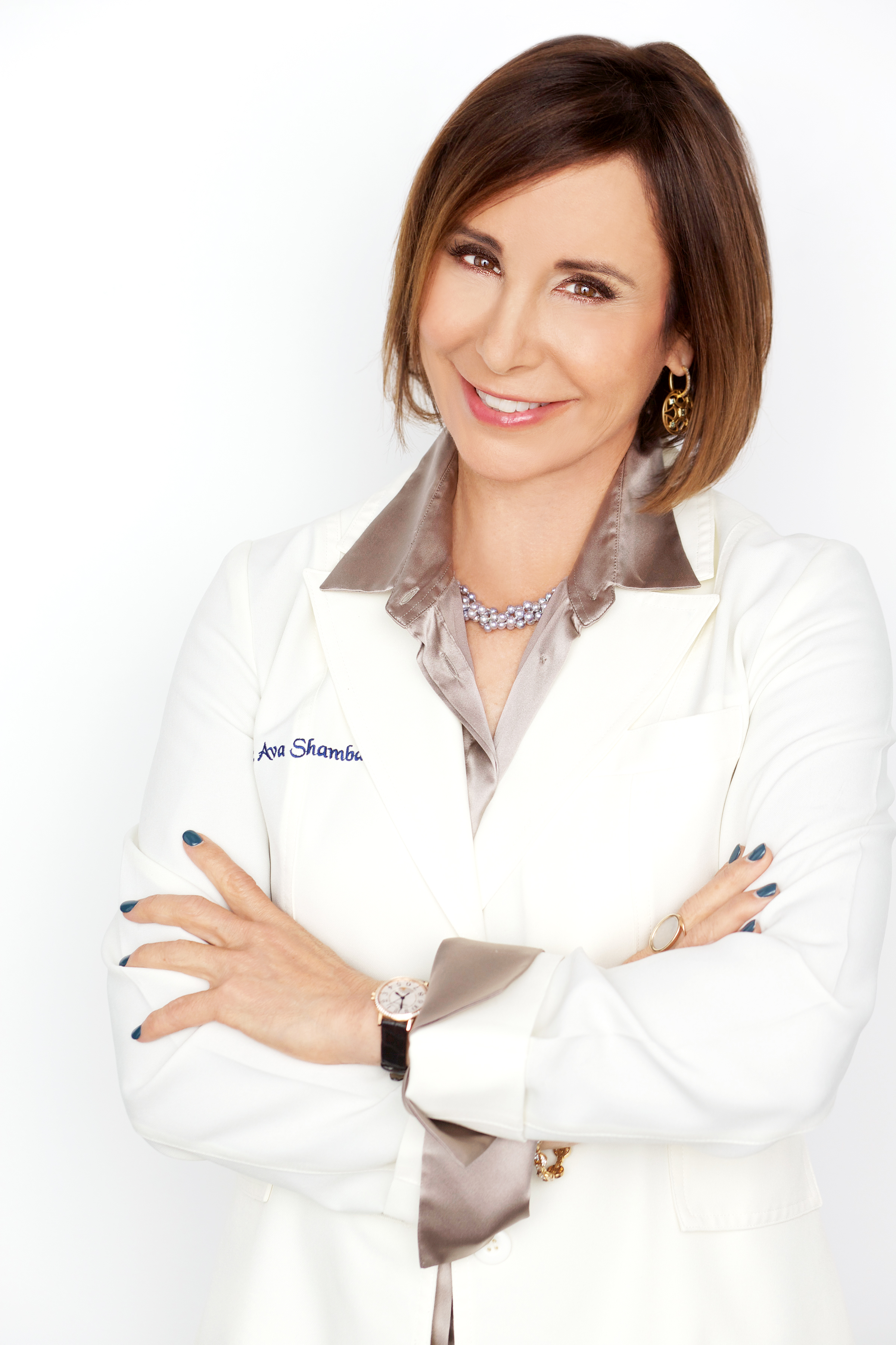 Dr. Ava Shambam in a white lab coat