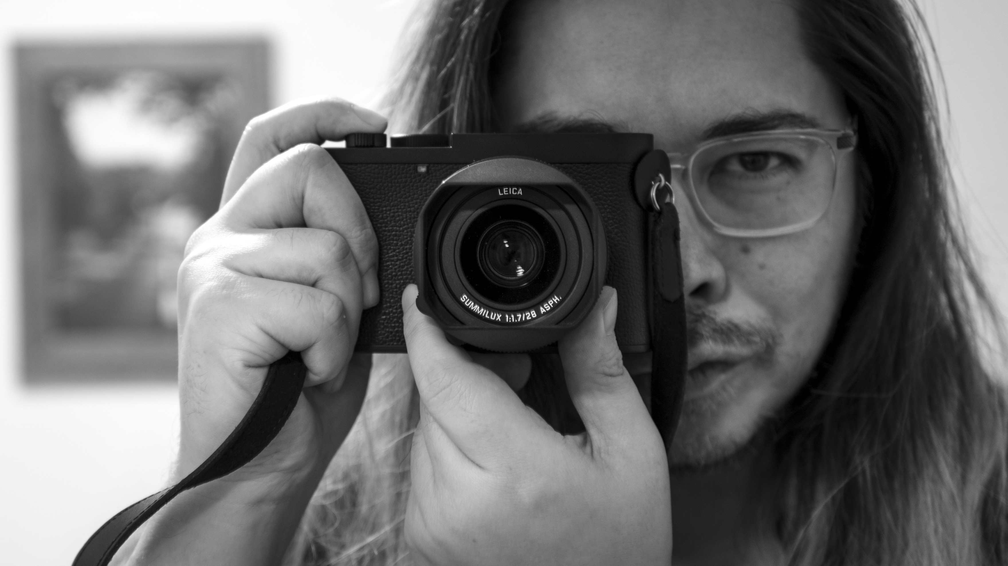 Photographer James Artaius holding a Leica Q3 Monochrom