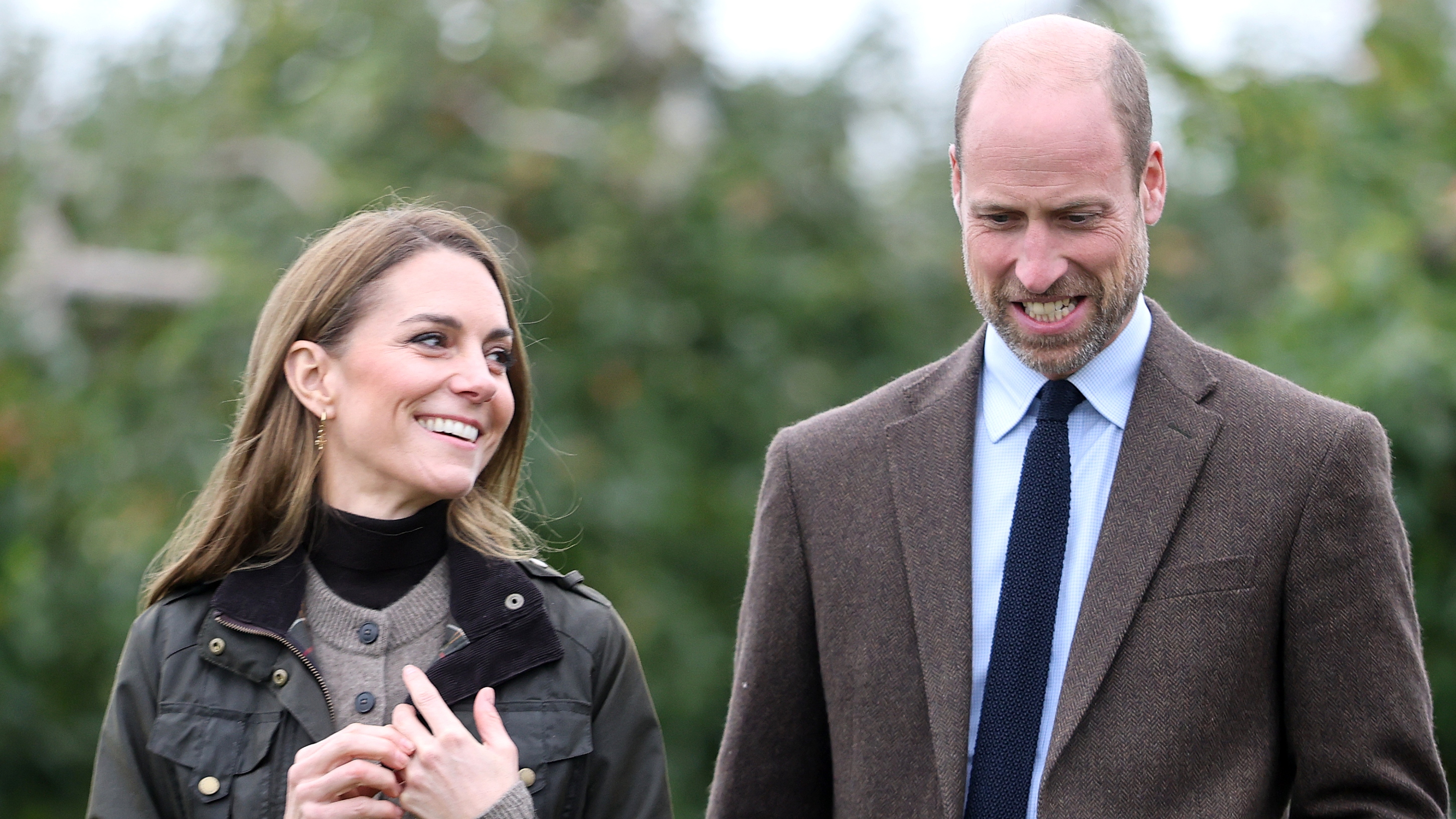 Catherine, Princess of Wales looks at Prince William as they walk in the orchards as they visit Long Meadow Cider on October 14, 2025