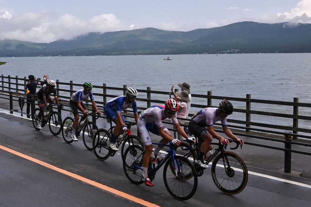 RL Slovakias Juraj Sagan leads the breakaway group Czech Republics Michael Kukrle Greeces Polychronis Tzortzakis Venezuelas Orluis Alberto Aular Sanabria and South Africas Nicholas Dlamini as they ride past Yamanaka Lake during the mens cycling road race of the Tokyo 2020 Olympic Games in Yamanashi Prefecture Japan on July 24 2021 Photo by Jeff PACHOUD AFP Photo by JEFF PACHOUDAFP via Getty Images