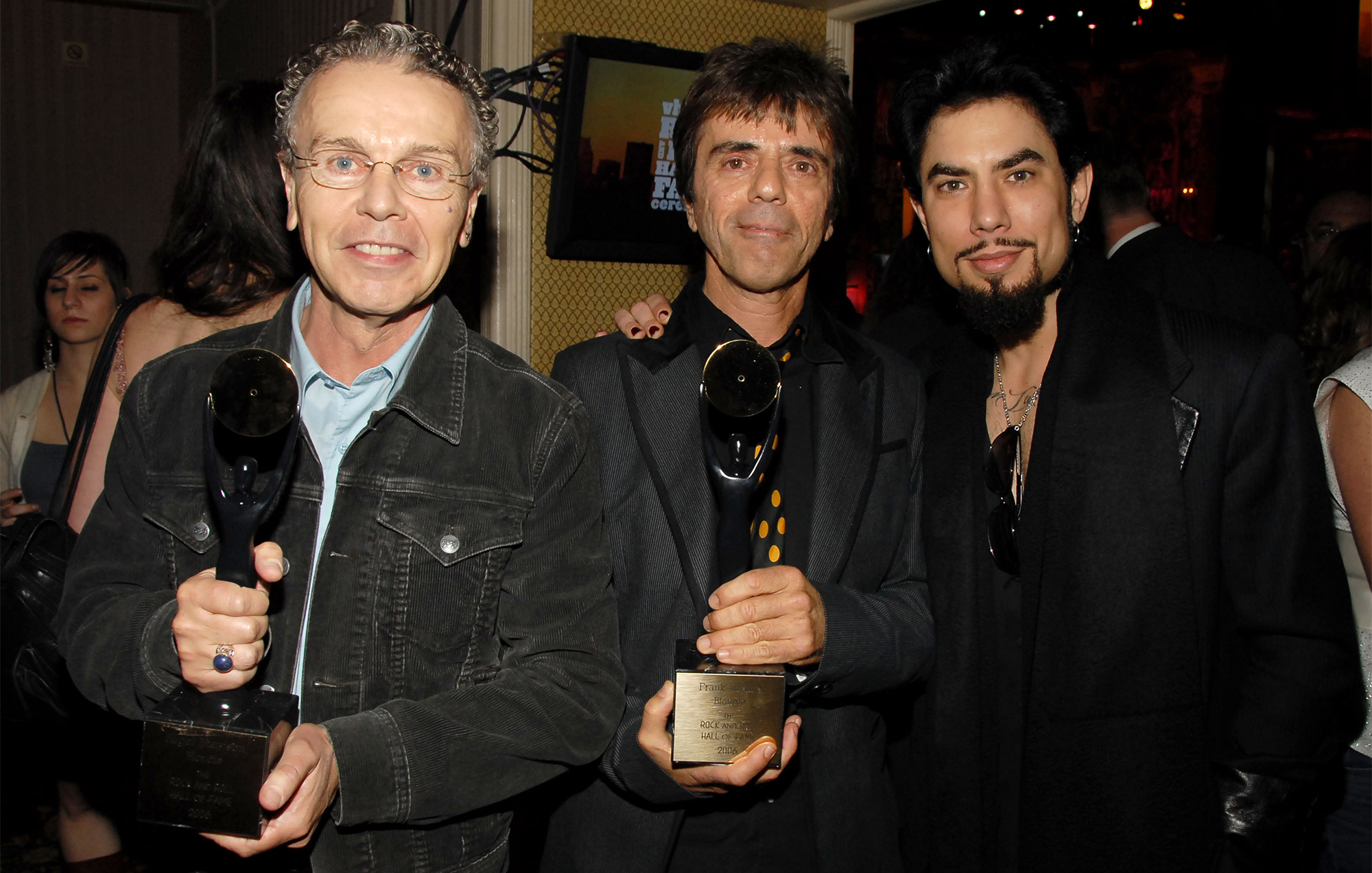 Nigel Harrison and Frank Infante of Blondie, inductees, with Dave Navarro