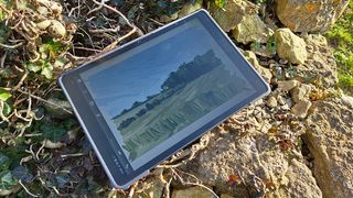 XPPen Magic Drawing Pad review; a drawing tablet on a stone wall