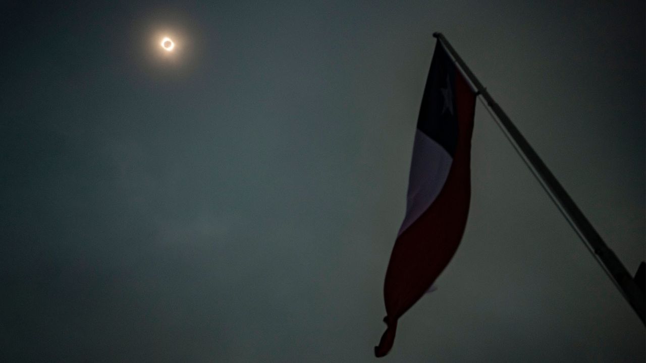 View of the total solar eclipse in Puc&oacute;n, southern Chile, on Dec. 14, 2020. Thousands of tourists and residents in Chile's south saw their hopes of watching a total eclipse of the sun shrink as heavy rain fell on Monday just hours before the expected event.