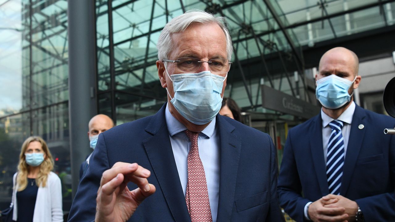 Michel Barnier address the press outside the European Commission building in Brussels 