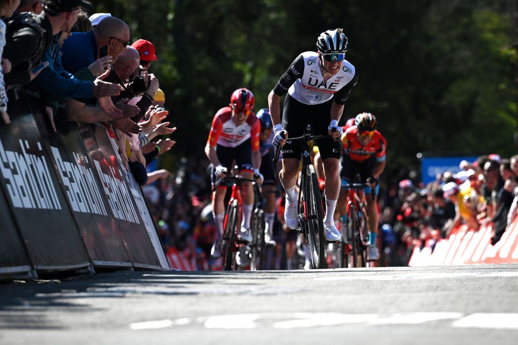 HUY BELGIUM APRIL 19 Tadej Pogaar of Slovenia and UAE Team Emirates sprint at finish line to win the 87th La Fleche Wallonne 2023 Mens Elite a 1943km one day race from Herve to Mur de Huy UCIWT on April 19 2023 in Huy Belgium Photo by David StockmanGetty Images