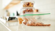 Ziploc bags filled with nuts on a kitchen counter