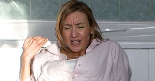 Earlier, Eva goes into labour at the cottage she's rented - while she's trapped in the bathroom without her phone.