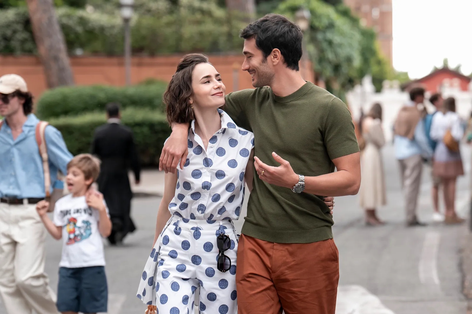 Lily Collins as Emily and Eugenio Franceschini as Marcello in Emily in Paris