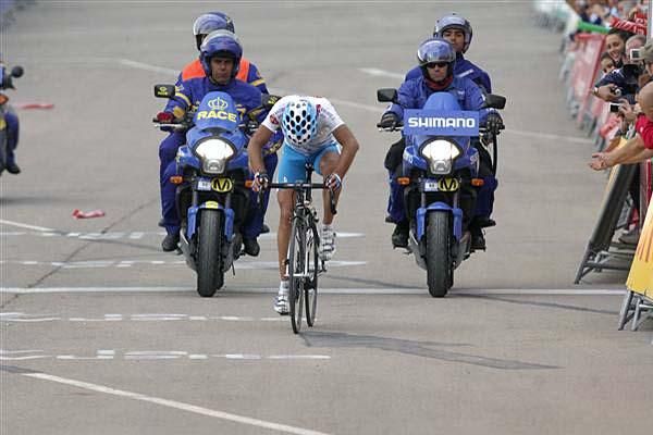 Ezequiel Mosquera (Xacobeo Galicia) pedals head-down to the line.